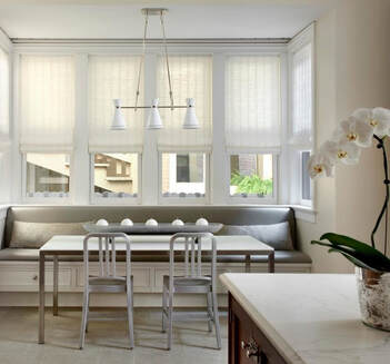 Call Ed Neir Construction to remodel your kitchen and create focal lighting in dinning area.